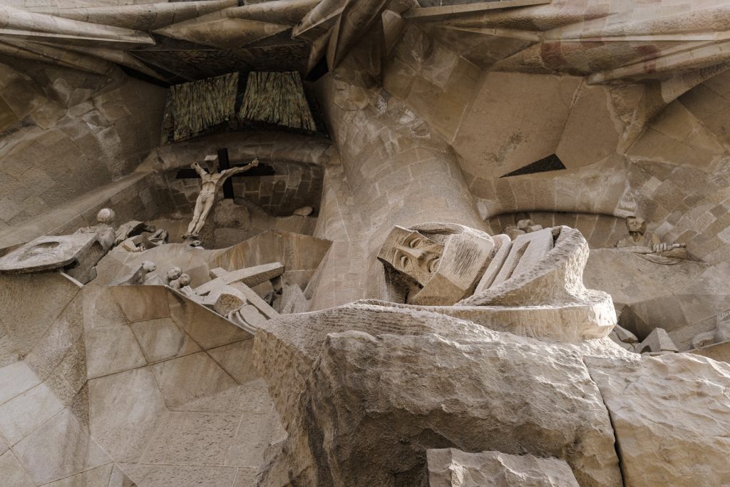 Stark and angular design of the Passion facade, depicting the crucifixion of Christ.